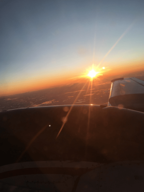 Sun setting from our turbo prop plane