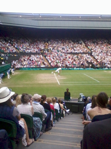 Andy Murray serves during the Semi Final of the 2013 Wimbledon Championships
