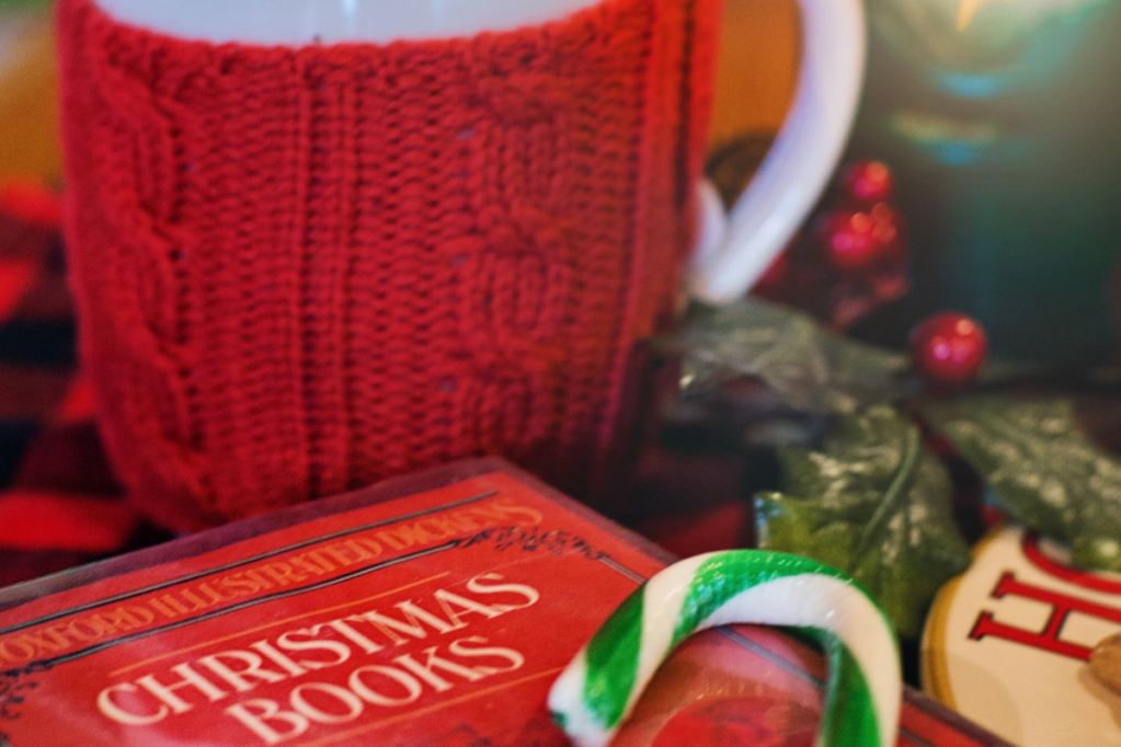 A book with candy cane and drink